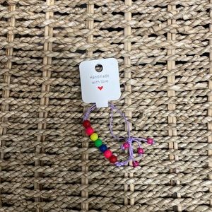 Selling a multicolored bracelet, kid size.